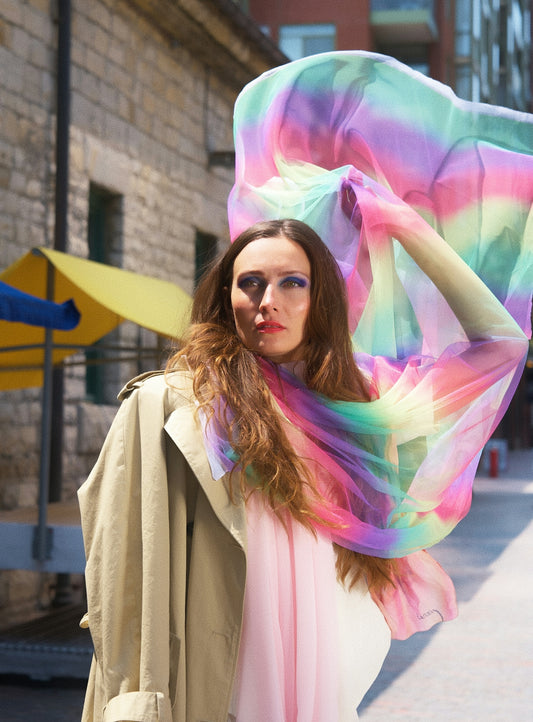 a woman with a colorful scarf on her head