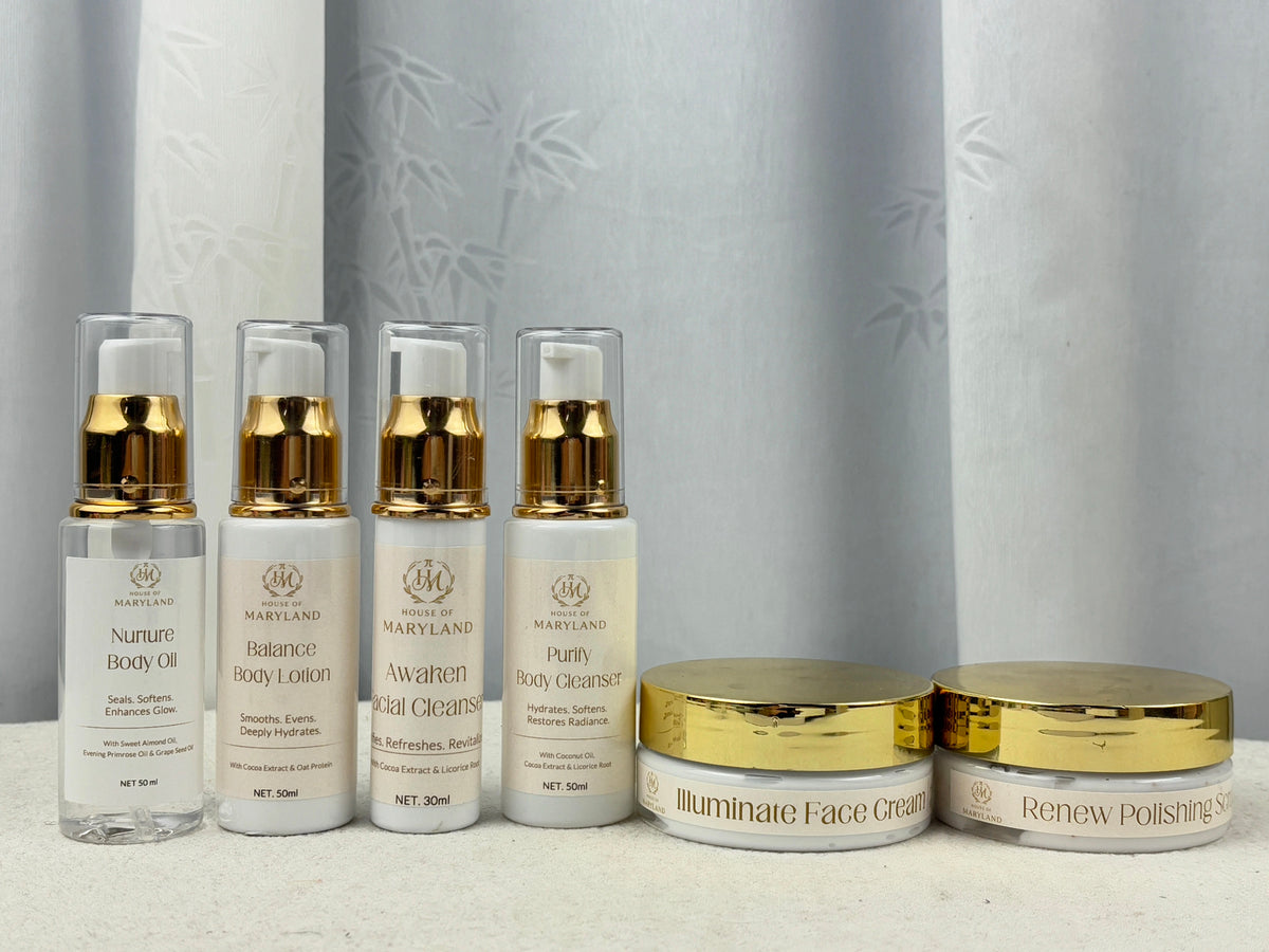 Skincare travel ritual set with 4 pump bottles and 2 gold-lidded face creams