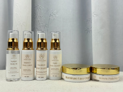 Skincare travel ritual set with 4 pump bottles and 2 gold-lidded face creams