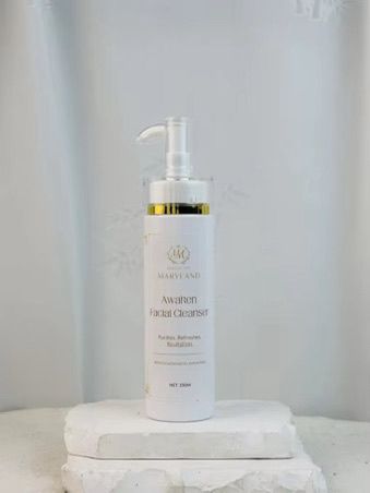 Awaken facial cleanser bottle with pump, clear white liquid, 150 mL