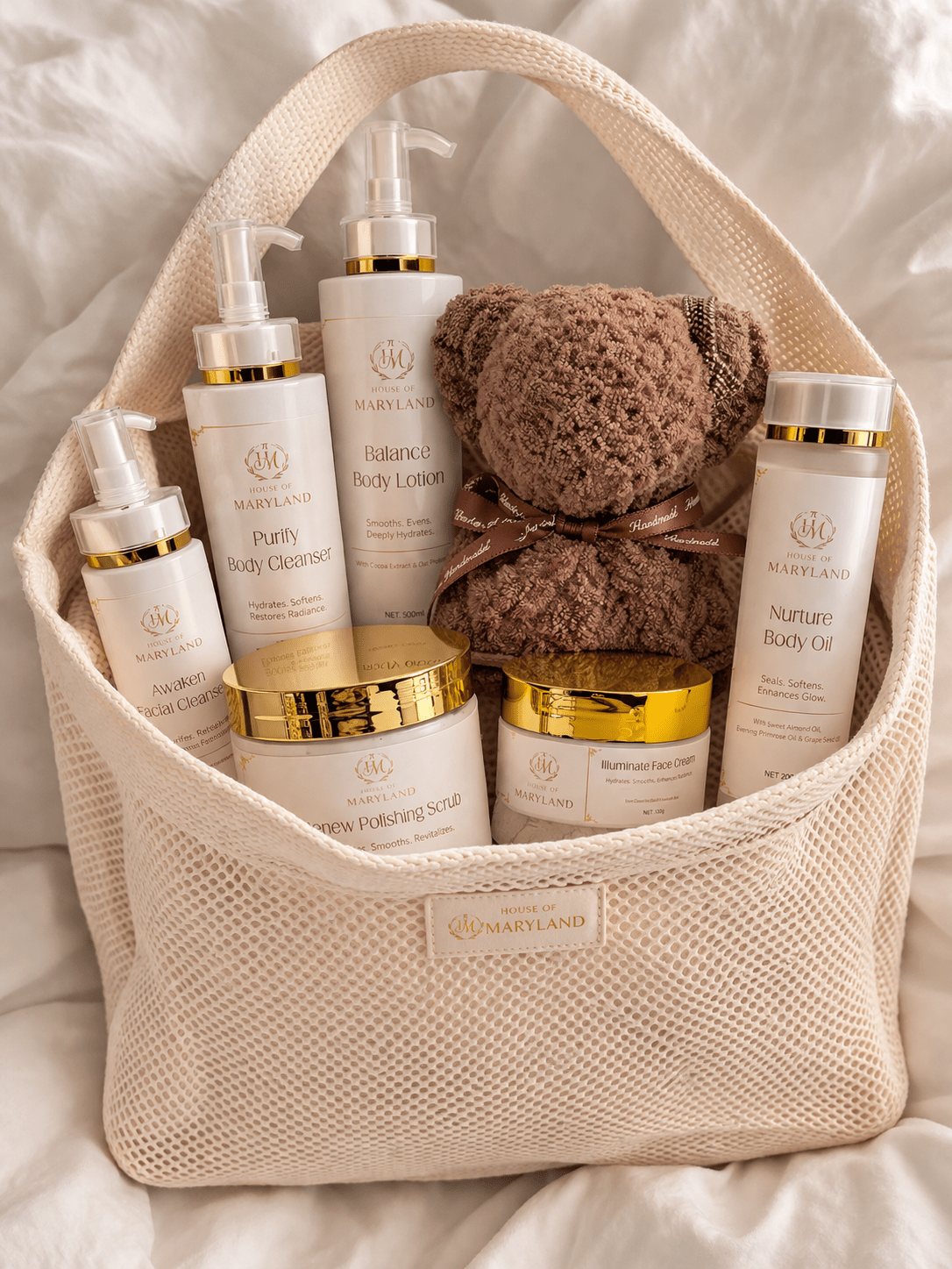 Skincare basket set with body care bottles, jars, and brown exfoliating cloths